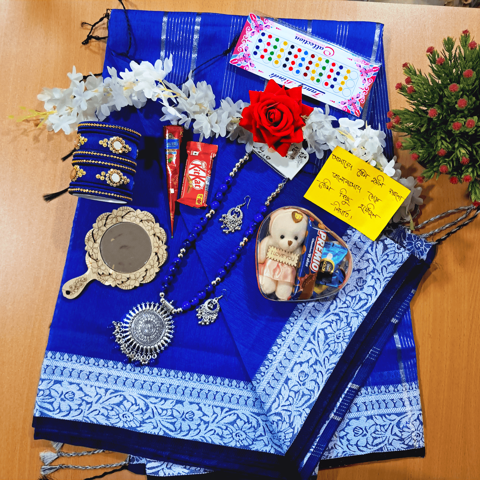 Saree Combo Gift Set - Which Contains Saree Necklace Earrings Bangles Mehedi Mirror Kitkat Tip Love Chocolate Box with Doll Rose Gazra Chirkut and More